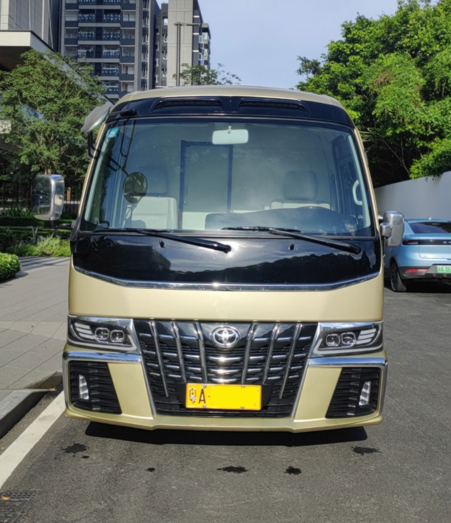 广东广州市区配带司机租12人座超级豪华丰田考斯特中巴车出租_广州租车包车 首选广州现达汽车租赁公司